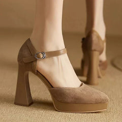 Brown Celeste Mary Jane heels by THE WHITMORE FAMILY, elegant sandal with a classic strap and stylish design.