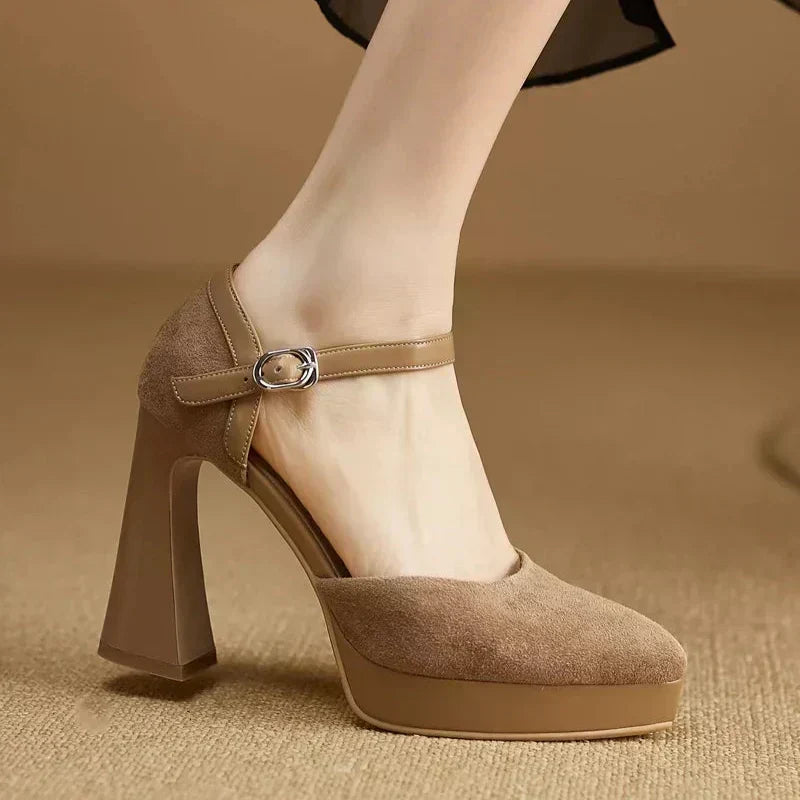 Brown Celeste Mary Jane sandal by THE WHITMORE FAMILY featuring elegant strap design and comfortable heel.