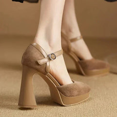 Brown Celeste Mary Jane heels by THE WHITMORE FAMILY, elegant sandal with classic strap design and comfortable heel.