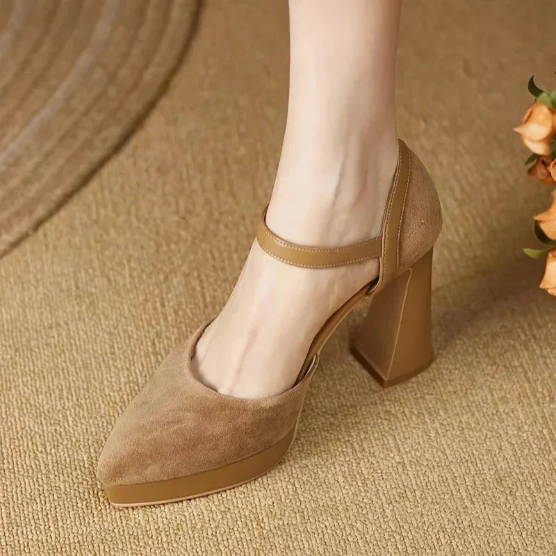 Brown Celeste Mary Jane heels by THE WHITMORE FAMILY, elegant sandal with strap and low heel, stylish and comfortable for formal wear.