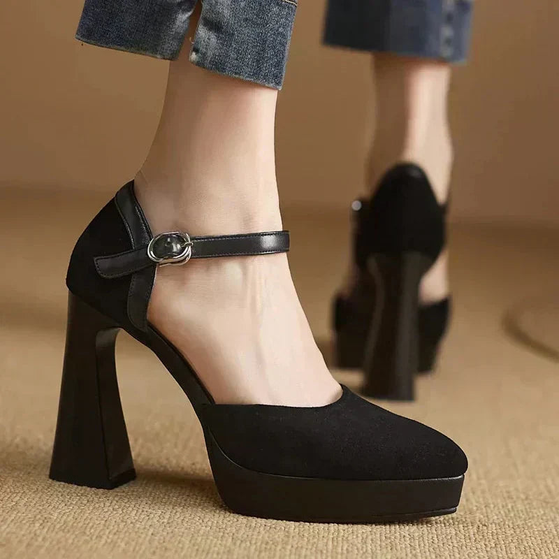 Brown Celeste Mary Jane heels by THE WHITMORE FAMILY featuring a classic sandal design and elegant strap details.