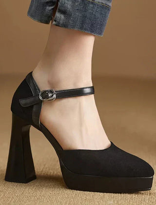 Brown Celeste Mary Jane heels by THE WHITMORE FAMILY, elegant sandal with a classic strap design and polished finish.