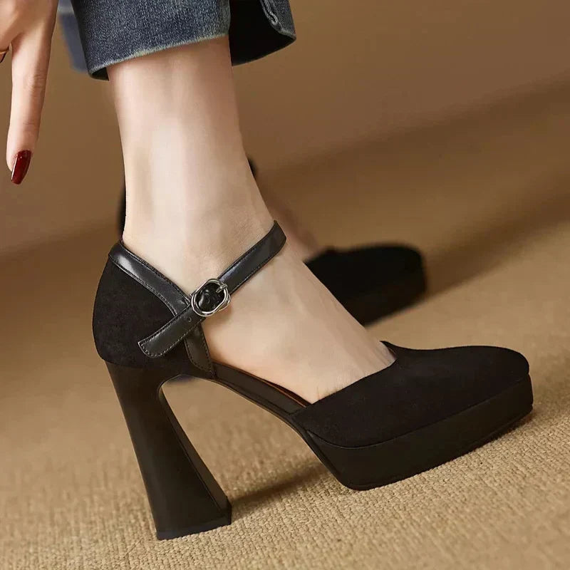 Brown Celeste Mary Jane heels by THE WHITMORE FAMILY, elegant sandal with a classic strap design and stylish heel.