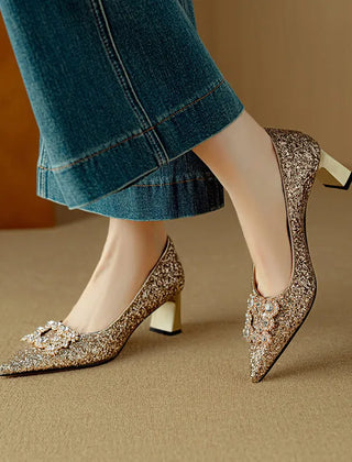 Gold glitter pumps from THE WHITMORE FAMILY's Gloria sandal collection, featuring a stylish open-toe design and block heel.