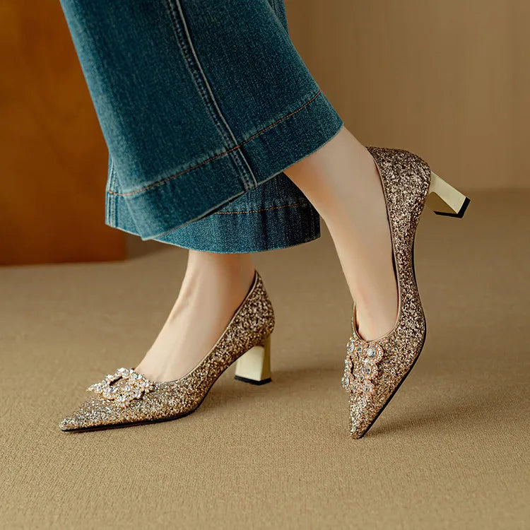 Gold glitter pumps from THE WHITMORE FAMILY's Gloria sandal collection, featuring a stylish open-toe design and block heel.