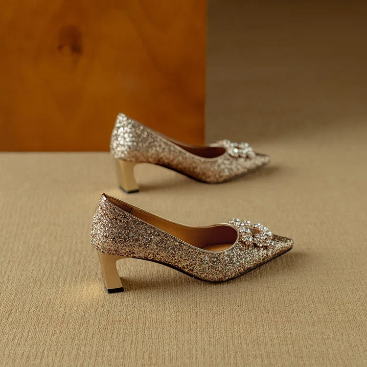 Gold glitter Gloria sandals by THE WHITMORE FAMILY featuring stylish pump design with a closed toe and elegant heel.