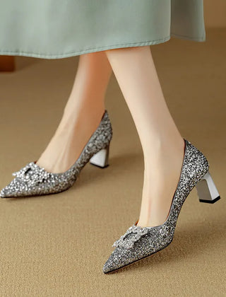Gold glitter pumps from THE WHITMORE FAMILY's Gloria collection, stylish sandal with a sparkling finish and elegant design.