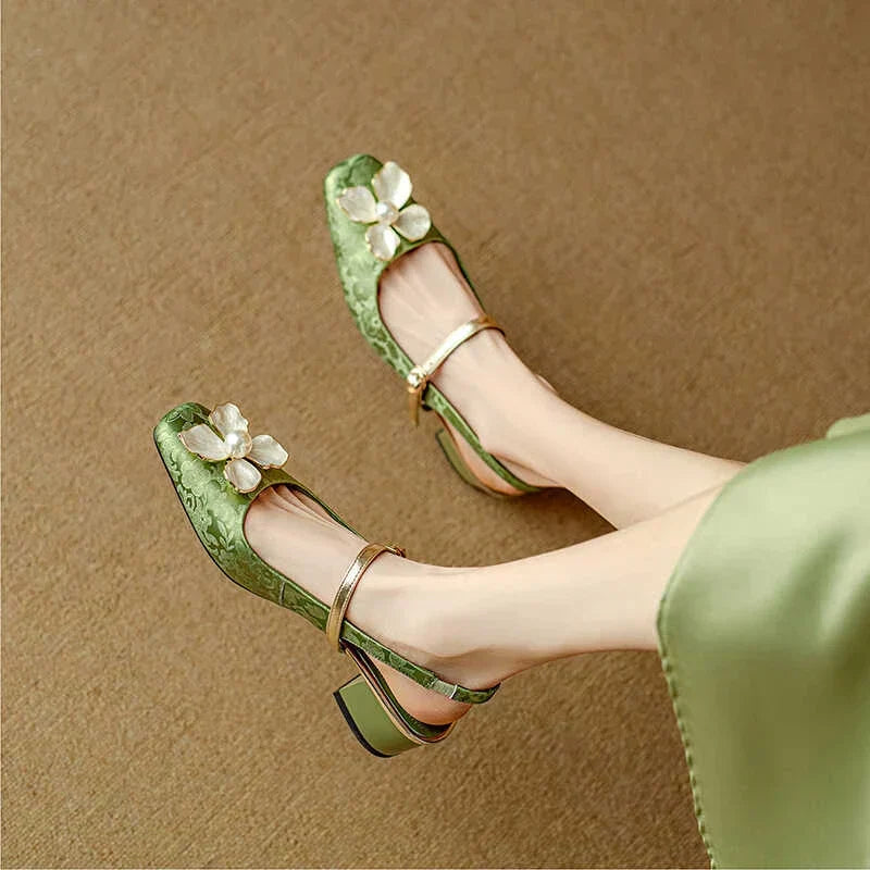Green Diana Genine slingback pumps by THE WHITMORE FAMILY, stylish sandal with a sleek design and comfortable fit.