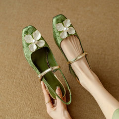 Green Diana Genine slingback pumps by THE WHITMORE FAMILY, stylish sandal with a sleek strap design and comfortable heel.
