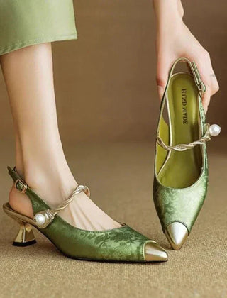 Green Karen elegant sandal by THE WHITMORE FAMILY featuring a stylish, fine pump design with sleek straps and a comfortable heel.