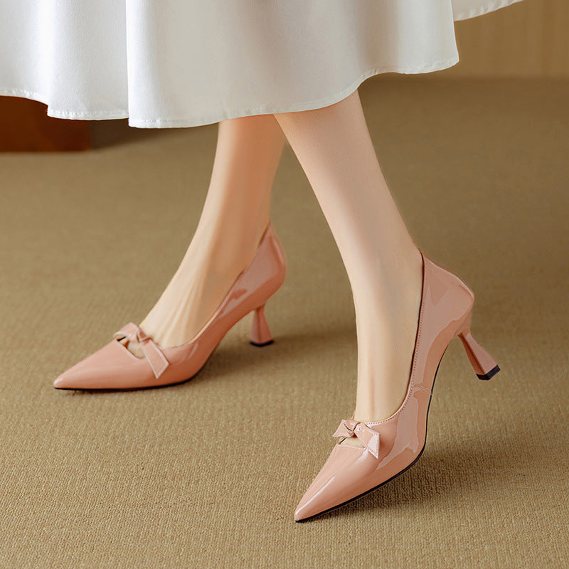 Pink leather sandal from THE WHITMORE FAMILY, Elayna Elegant Leather Pumps featuring a sleek, stylish design and comfortable fit.
