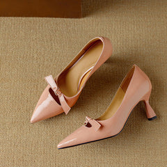 Pink leather sandal called Elayna by THE WHITMORE FAMILY featuring elegant design and open toe for stylish summer wear.