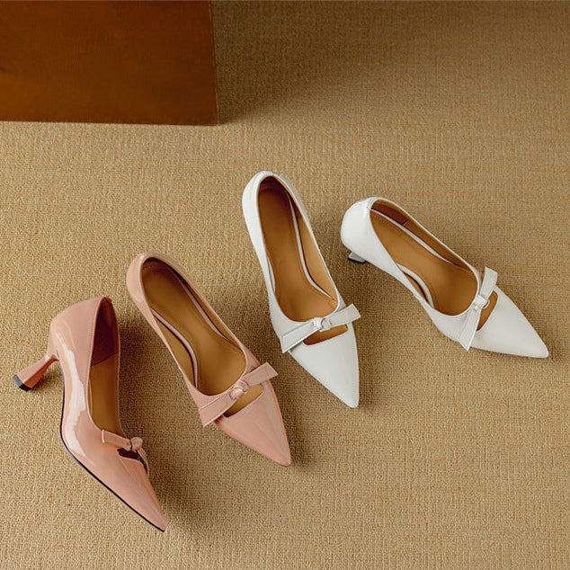 Pink leather sandal featuring elegant straps and a stylish design, from THE WHITMORE FAMILY's Elayna collection.