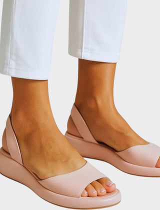 Yellow Caryzzaa™ orthopedic sandals by THE WHITMORE FAMILY with cushioned straps and supportive sole, designed for comfort and style.