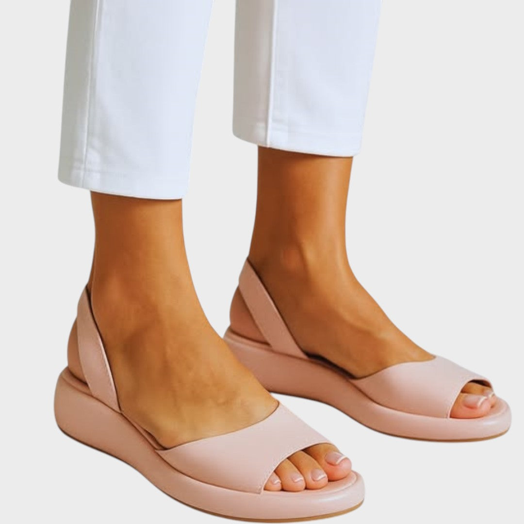 Yellow Caryzzaa™ orthopedic sandals by THE WHITMORE FAMILY with cushioned straps and supportive sole, designed for comfort and style.