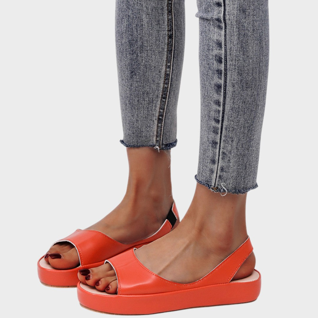 Yellow Caryzzaa™ orthopedic sandals by THE WHITMORE FAMILY, featuring cushioned soles and supportive straps.