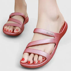 Black Daryell™ orthopedic sandals by THE WHITMORE FAMILY, featuring supportive straps and cushioned soles.
