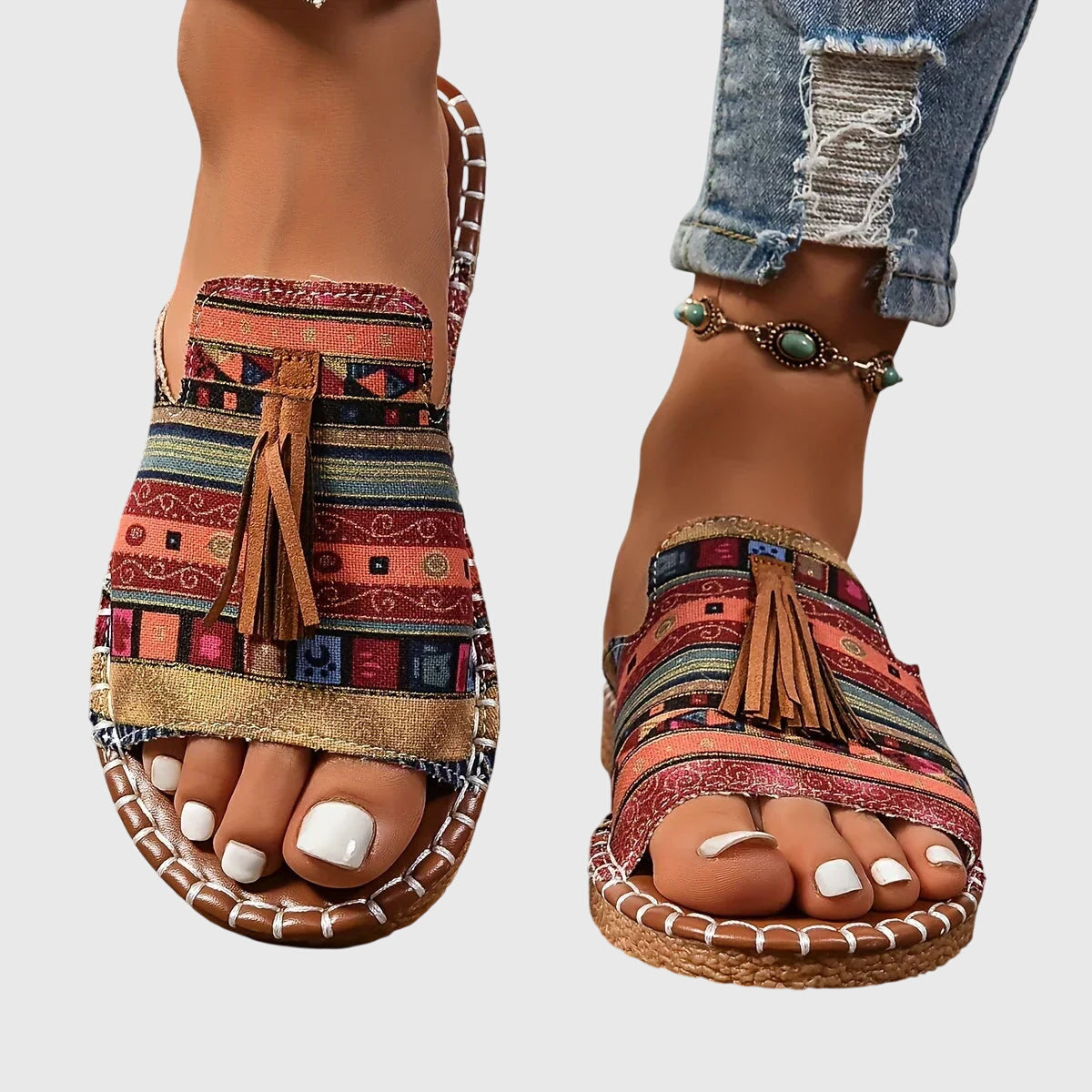 Lorraine™ orthopedic sandals by THE WHITMORE FAMILY featuring supportive straps and cushioned soles for comfort.
