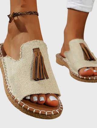Lorraine™ orthopedic sandals by THE WHITMORE FAMILY, beige sandals with cushioned insoles and adjustable straps for comfort.