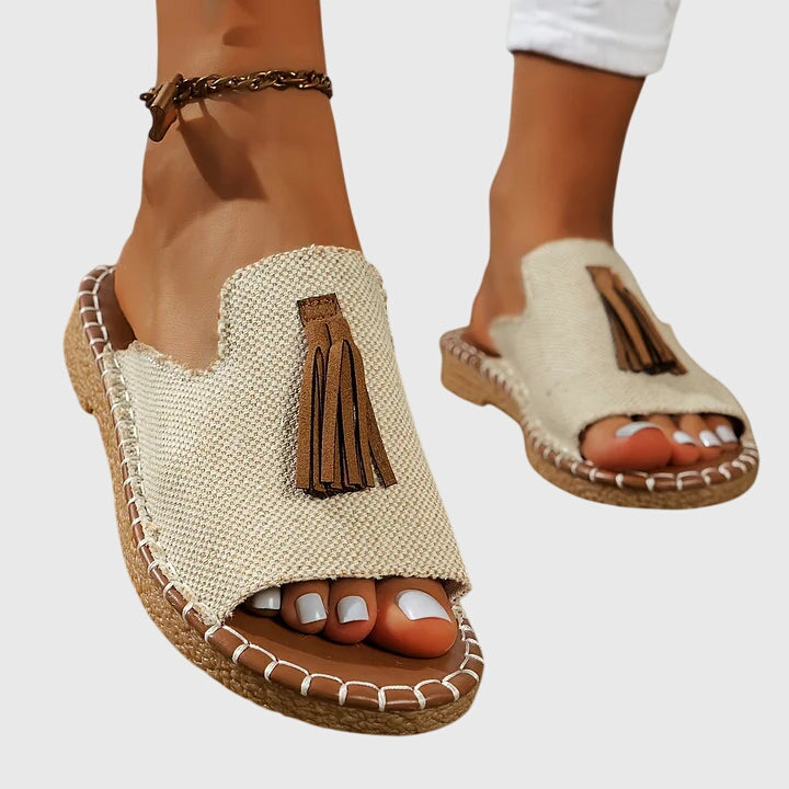 Lorraine™ orthopedic sandals by THE WHITMORE FAMILY, beige sandals with cushioned insoles and adjustable straps for comfort.