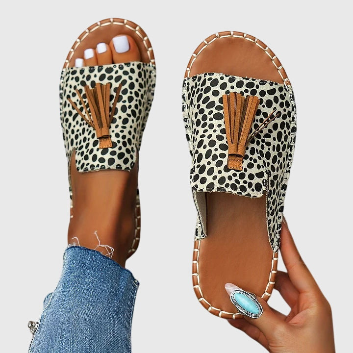 Lorraine™ orthopedic sandals by THE WHITMORE FAMILY featuring supportive straps and cushioned soles for comfort.