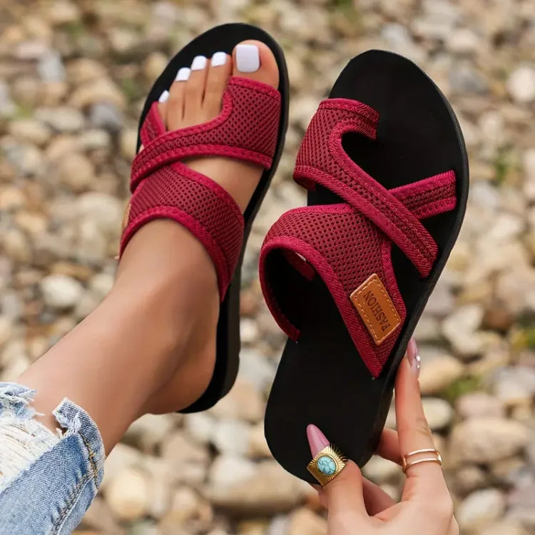Black Natalie™ orthopedic sandals by THE WHITMORE FAMILY, featuring supportive straps and cushioned soles for comfortable wear.