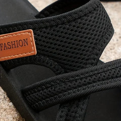 Black Natalie™ orthopedic sandals by THE WHITMORE FAMILY, stylish shoes with supportive soles and open-toe design.
