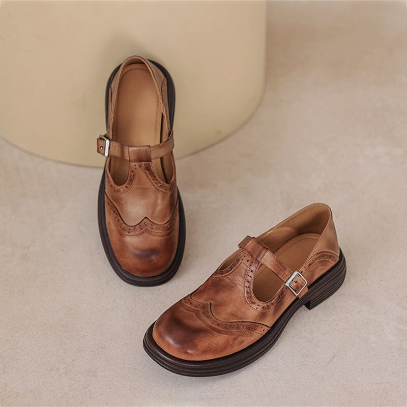 Brown Matea elegant Mary Janes shoes by THE WHITMORE FAMILY with a classic design and polished finish.