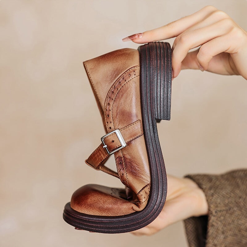 Brown Matea Elegant Mary Janes shoes by THE WHITMORE FAMILY, featuring classic design and comfortable fit.