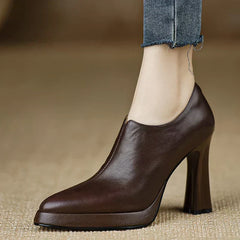 Brown Carina™ stylish pumps by THE WHITMORE FAMILY, elegant shoes with a sleek design and comfortable fit.