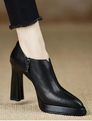 Brown Carina™ stylish pumps from THE WHITMORE FAMILY, elegant shoes and sandals with a sleek design.