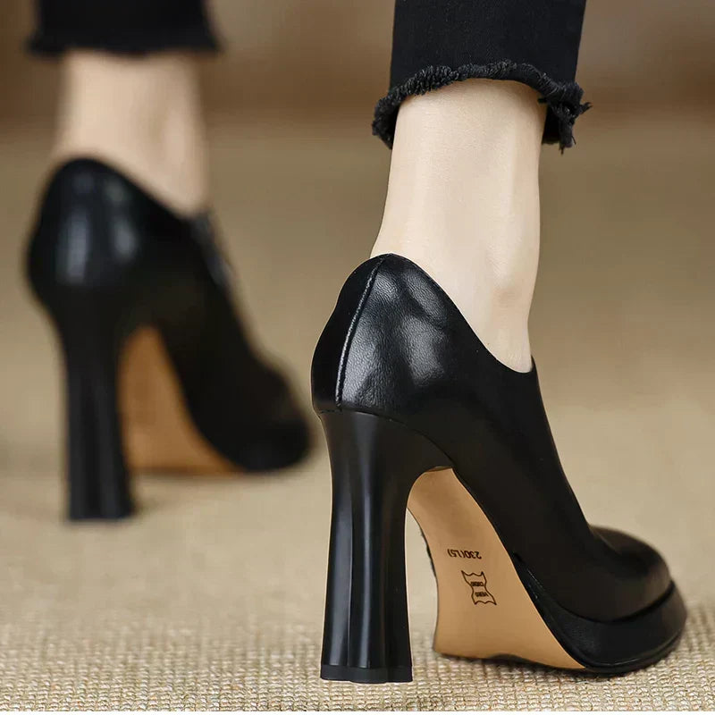Brown Carina™ stylish pumps by THE WHITMORE FAMILY, showcasing elegant design and comfortable heel for women.