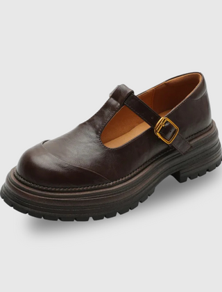 Brown Farisse T-bar Mary Janes by THE WHITMORE FAMILY, stylish shoes with classic T-strap design and comfortable fit.