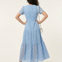 Brielle V-neck short sleeve tiered midi dress by THE WHITMORE FAMILY, with a flowing, layered skirt and fitted bodice.