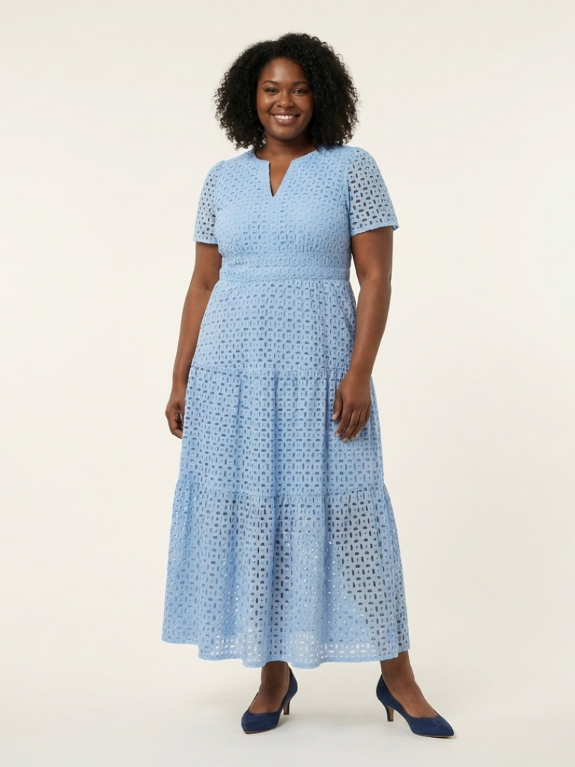 Brielle V neck short sleeve tiered midi dress by THE WHITMORE FAMILY, featuring a flowing silhouette and layered design.