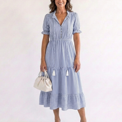 Dakota short sleeve striped tiered midi dress by THE WHITMORE FAMILY, featuring a lightweight fabric and stylish tiered design.