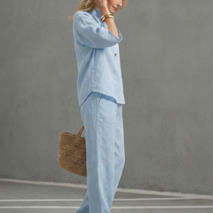 Sky blue Amity button-front relaxed tunic and trouser set by THE WHITMORE FAMILY, casual and comfortable women's outfit.