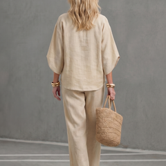 Sky blue Amity button-front relaxed tunic and trouser set by THE WHITMORE FAMILY, casual and comfortable women's outfit.