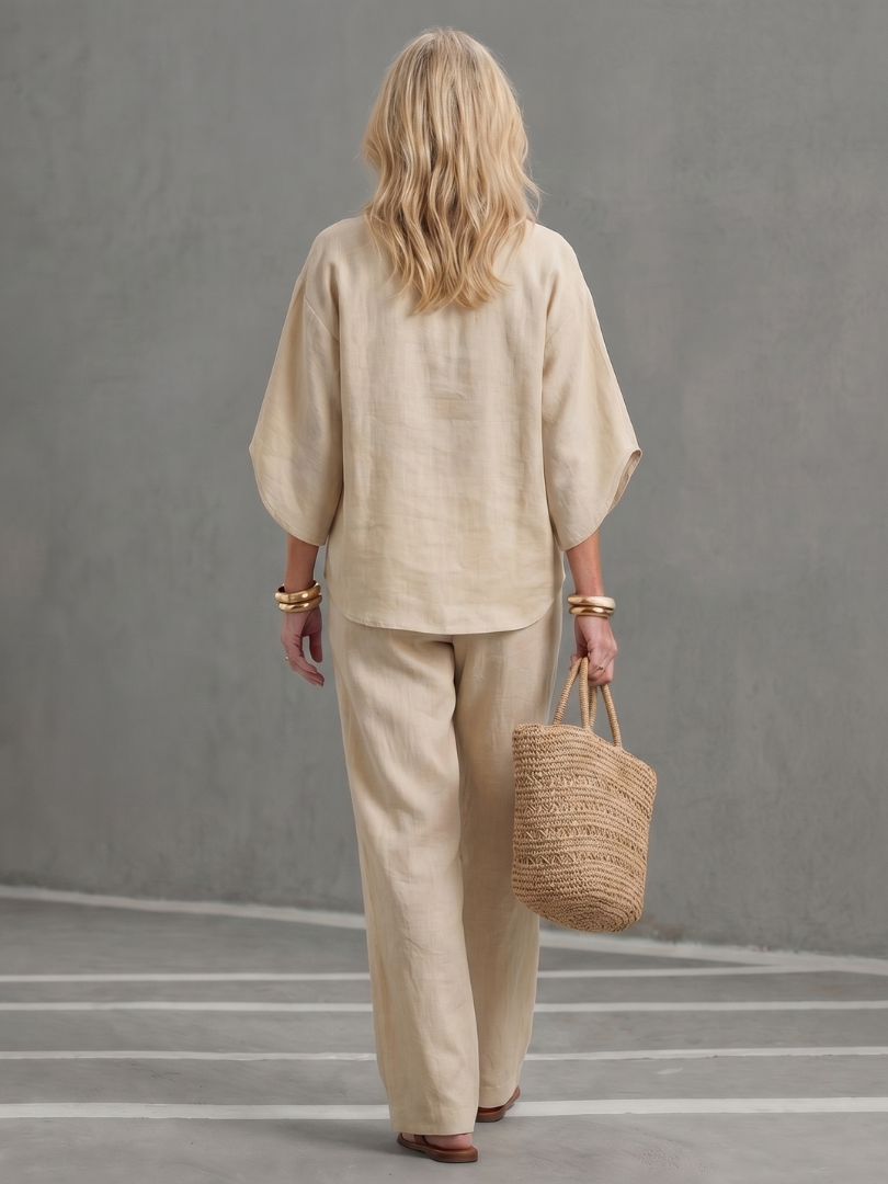 Sky blue Amity button-front relaxed tunic and trouser set by THE WHITMORE FAMILY, casual and comfortable women's outfit.