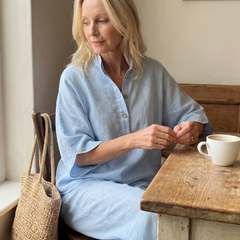 Sky-blue Amity button-front relaxed tunic and trouser set by THE WHITMORE FAMILY, featuring a comfortable, casual style.