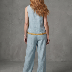 Sky blue sleeveless top and wide-leg contrast pants set by THE WHITMORE FAMILY, stylish and comfortable women's clothing ensemble.