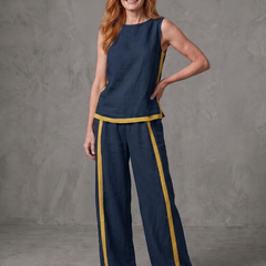 Sky blue sleeveless top and wide-leg contrast pants set by THE WHITMORE FAMILY, casual stylish outfit for women.