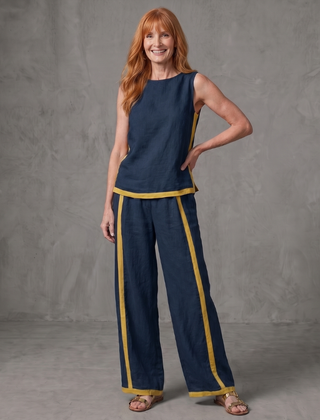 Sky blue sleeveless top and wide-leg contrast pants set by THE WHITMORE FAMILY, casual stylish outfit for women.