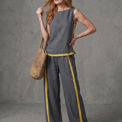 Sky blue sleeveless top and wide-leg contrast pants set by THE WHITMORE FAMILY, stylish and comfortable casual outfit.