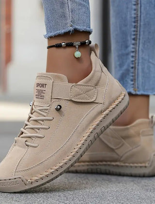 Beige Heather™ Ergonomic Support Sneakers by THE WHITMORE FAMILY, showcasing cushioned soles and supportive design for comfort.