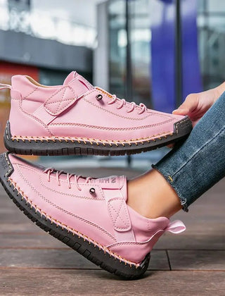 Pink Mila™ ergonomic support sneakers by THE WHITMORE FAMILY, featuring cushioned soles and breathable design for comfort.