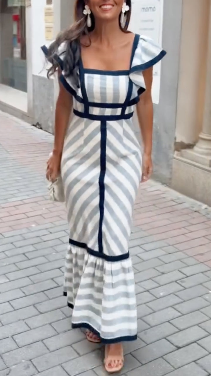 Dianne retro striped maxi dress by THE WHITMORE FAMILY featuring bold vertical stripes and a flowing silhouette.