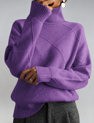 Lauren™ Luxe Turtleneck Sweater from THE WHITMORE FAMILY, soft knit, close-up of beige sweater with ribbed collar and fabric texture.