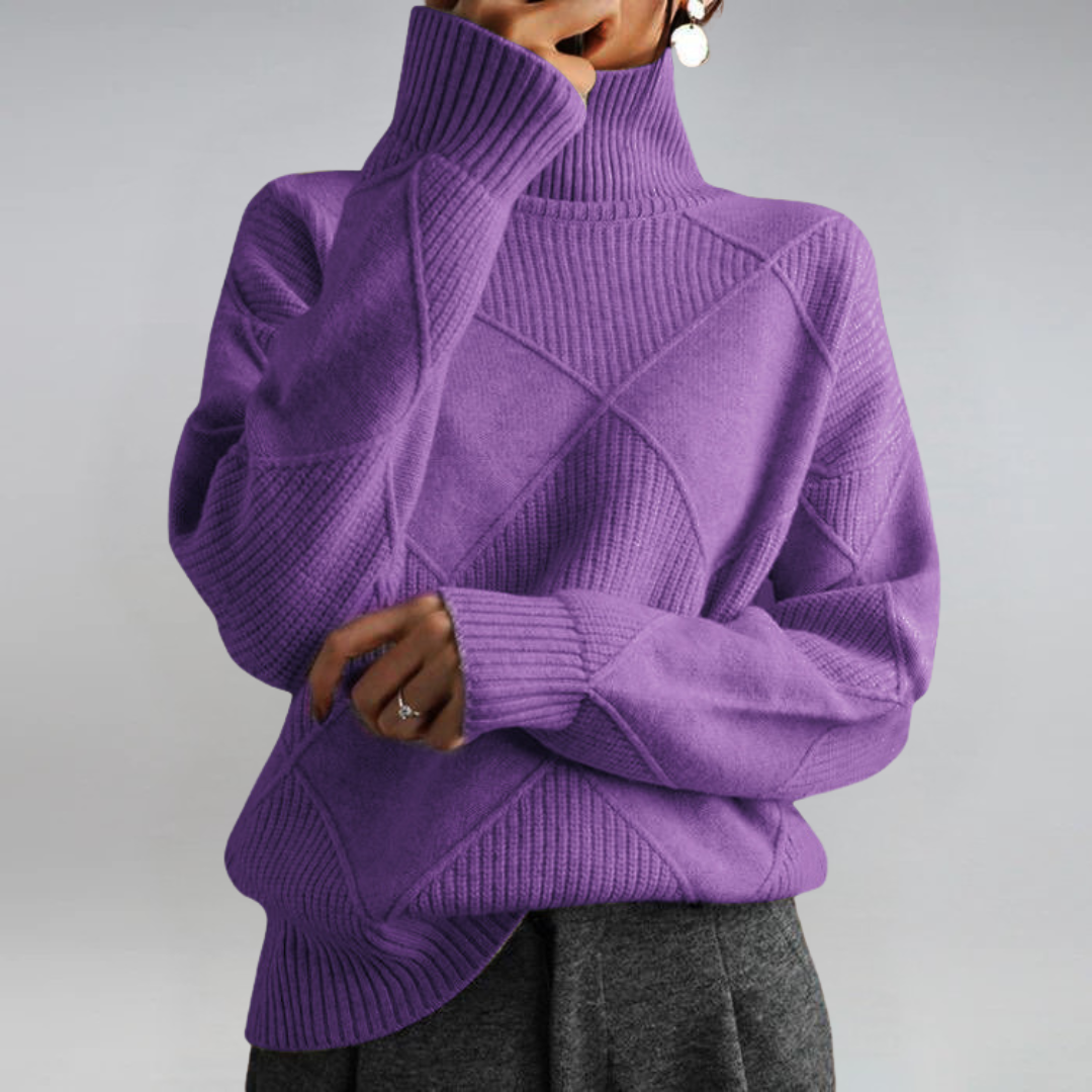 Lauren™ Luxe Turtleneck Sweater from THE WHITMORE FAMILY, soft knit, close-up of beige sweater with ribbed collar and fabric texture.