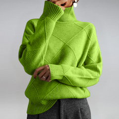 Lauren™ Luxe Turtleneck Sweater by THE WHITMORE FAMILY, shown in a cozy knit with a high neckline and long sleeves.
